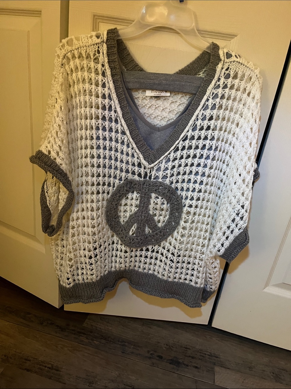 Mellow White Crochet Sleeveless Slouchy Vest with Gray Trim and Peace Motif